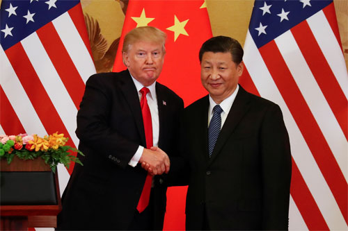 Tổng thống Mỹ Donald Trump, trái, và Chủ tịch Trung Quốc Tập Cận Bình trong cuộc gặp ở Bắc Kinh tháng 11/2017. Ảnh: Reuters.